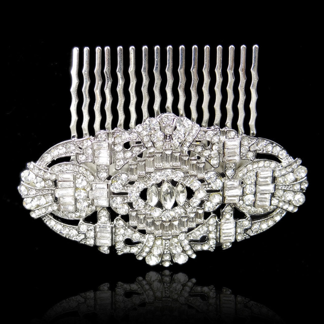 

Гребень Современный DiaDemaGrand Серебряный с белым камнем (0716453-15-2)