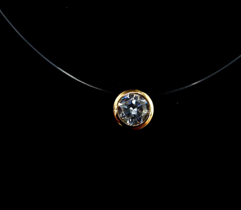 

Камушек на леске под золото в огранке Soroka