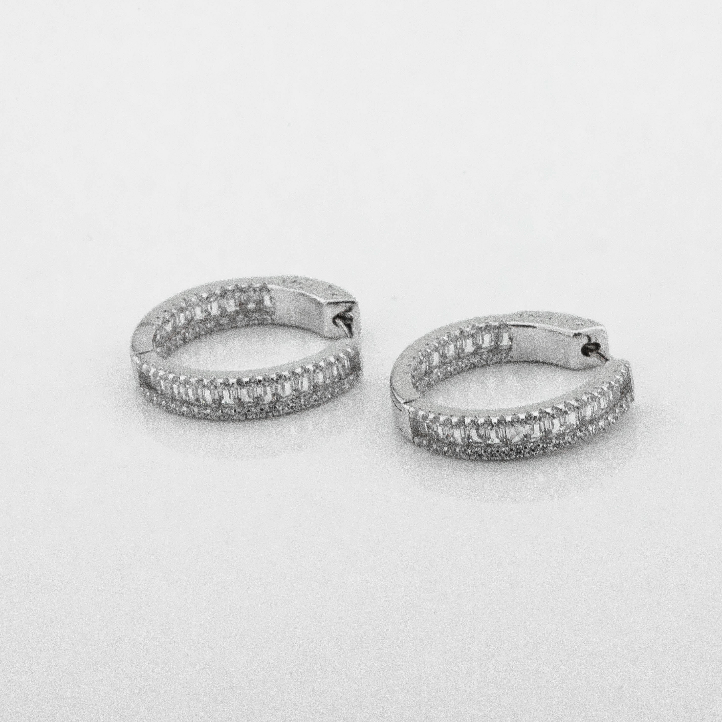 

Серебряные серьги-кольца с фианитами c121621 Диамант