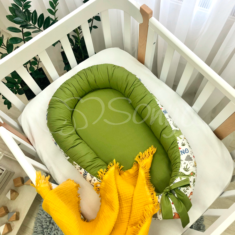 

Кокон для новорожденных (позиционер гнездышко) Baby Design Дино олива 90х65 см
