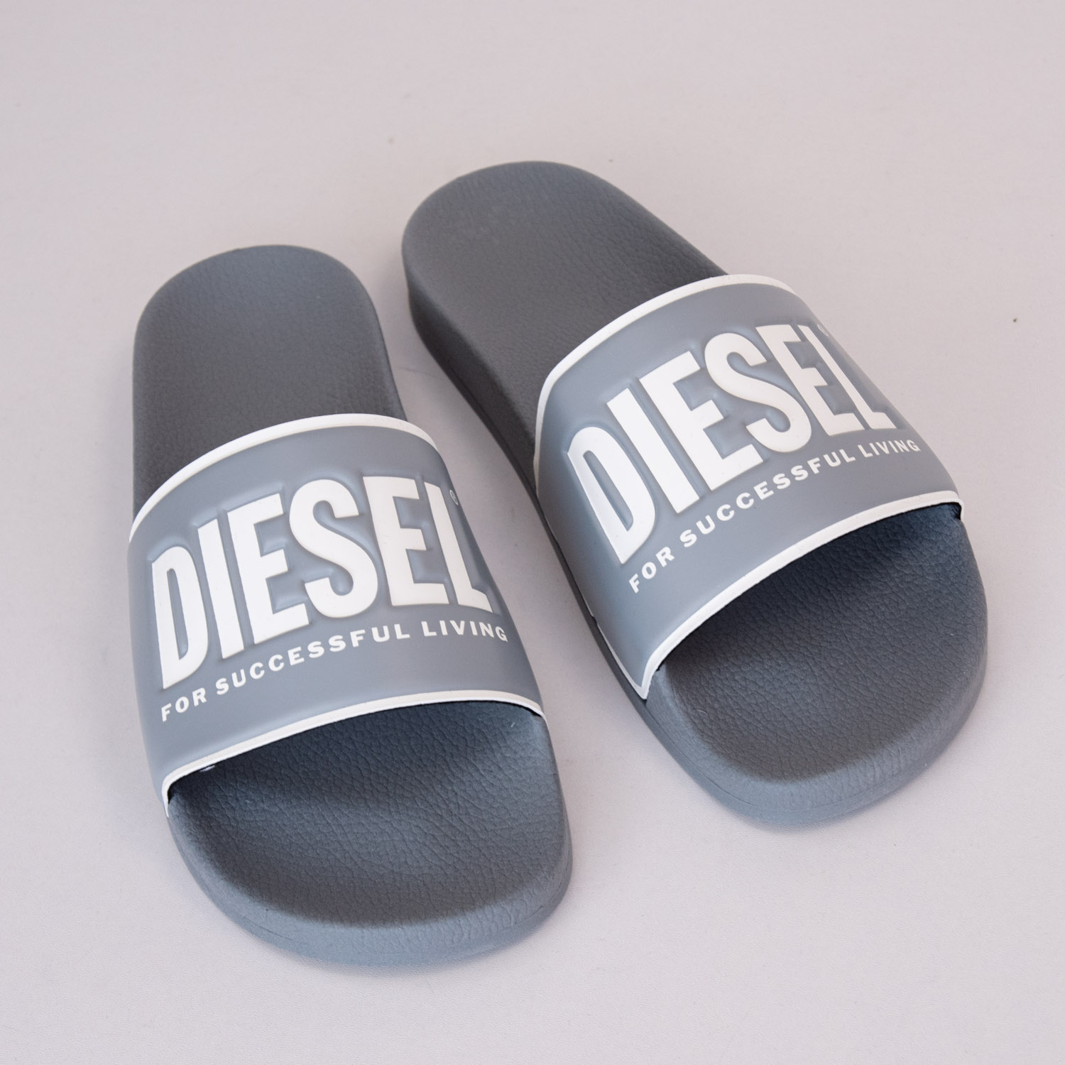 

Шлепанцы Diesel SA-VALLA Lead/Star White 42