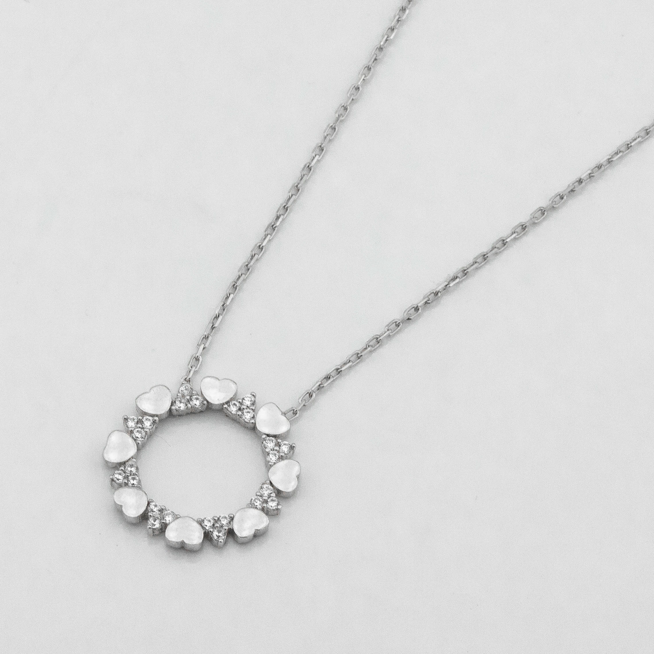 

Серебряное колье Сердечки с фианитами ko14607 Диамант