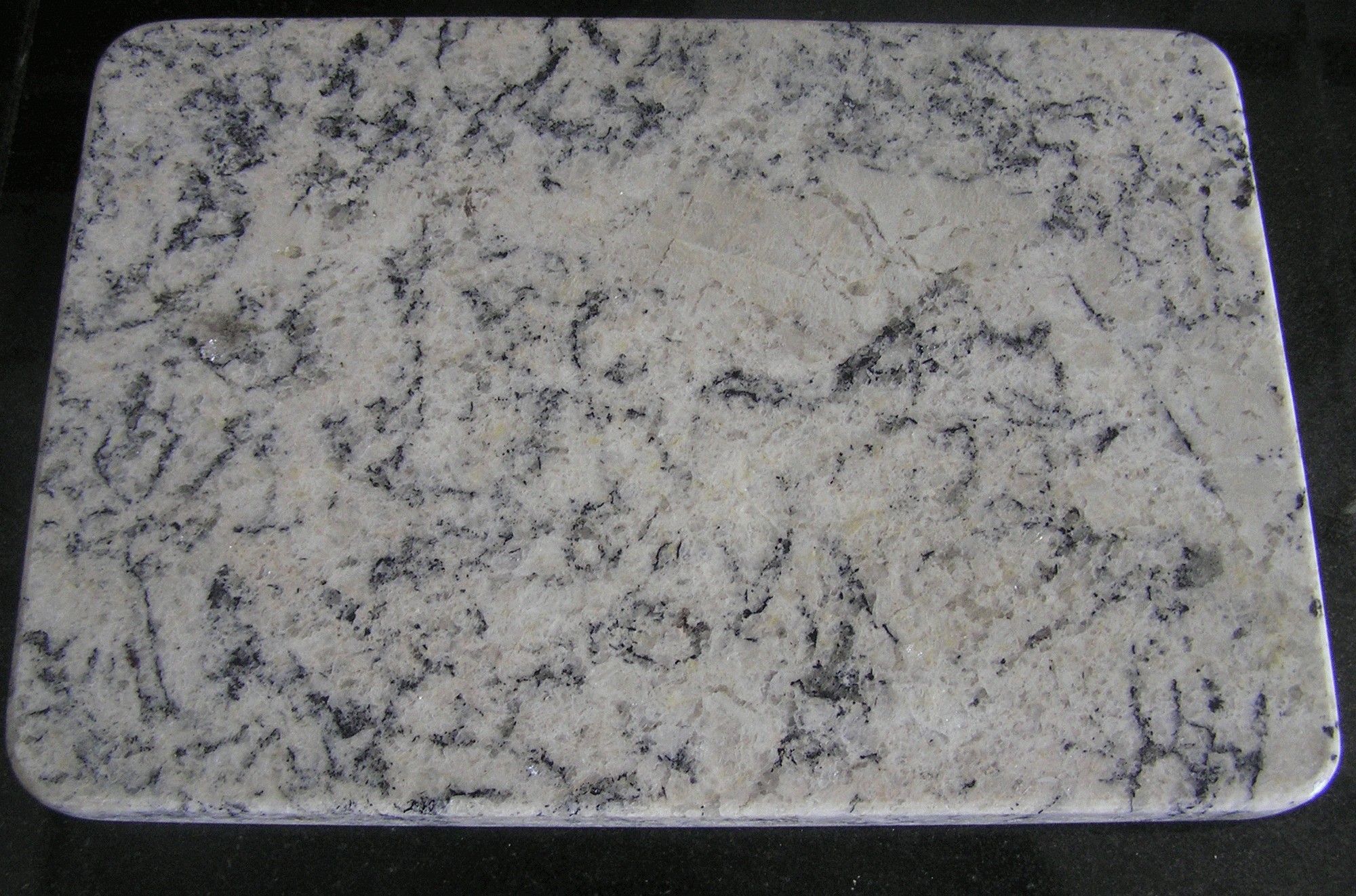 

Разделочная, сервировочная доска из гранита WHITE ICE 34*23,5*2см