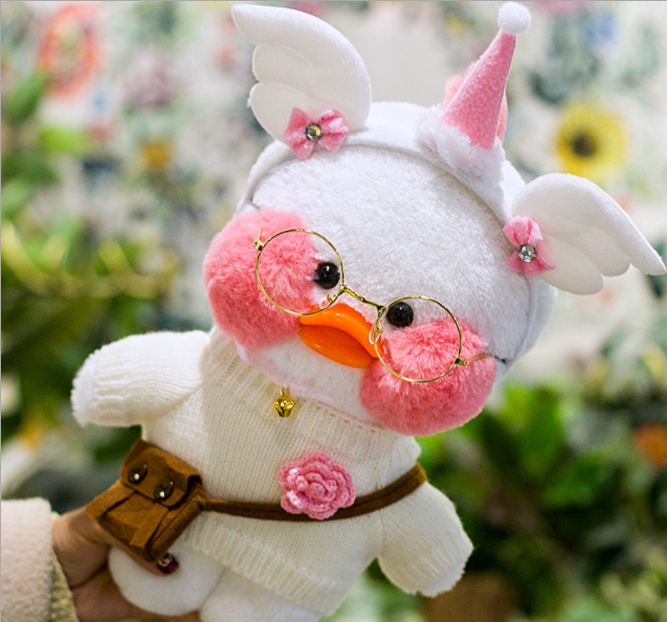 

Мягкая игрушка уточка "Сafe-mimi duck" в белом свитере с розочкой 30 см.