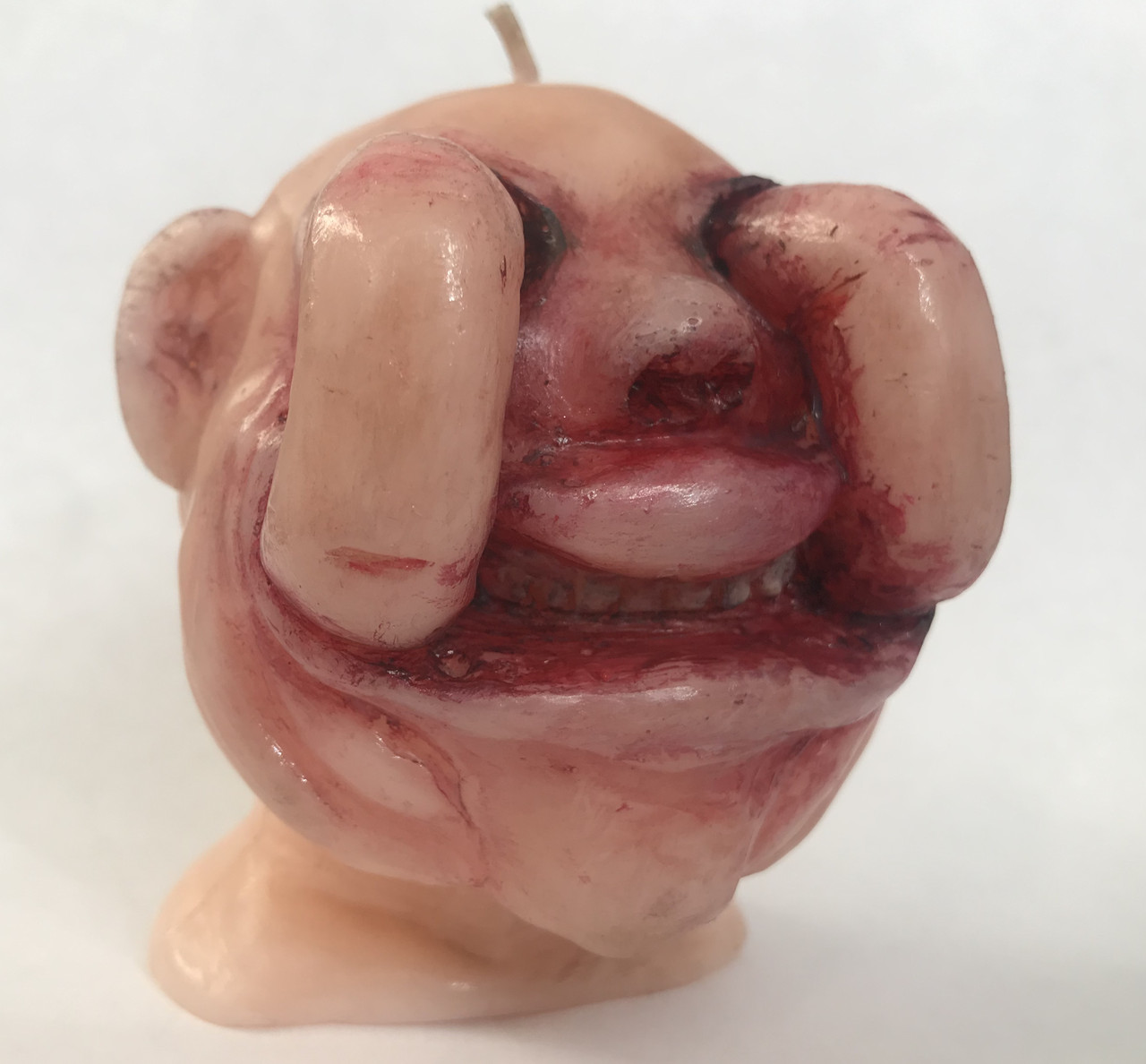 

Свечка Self-eating man