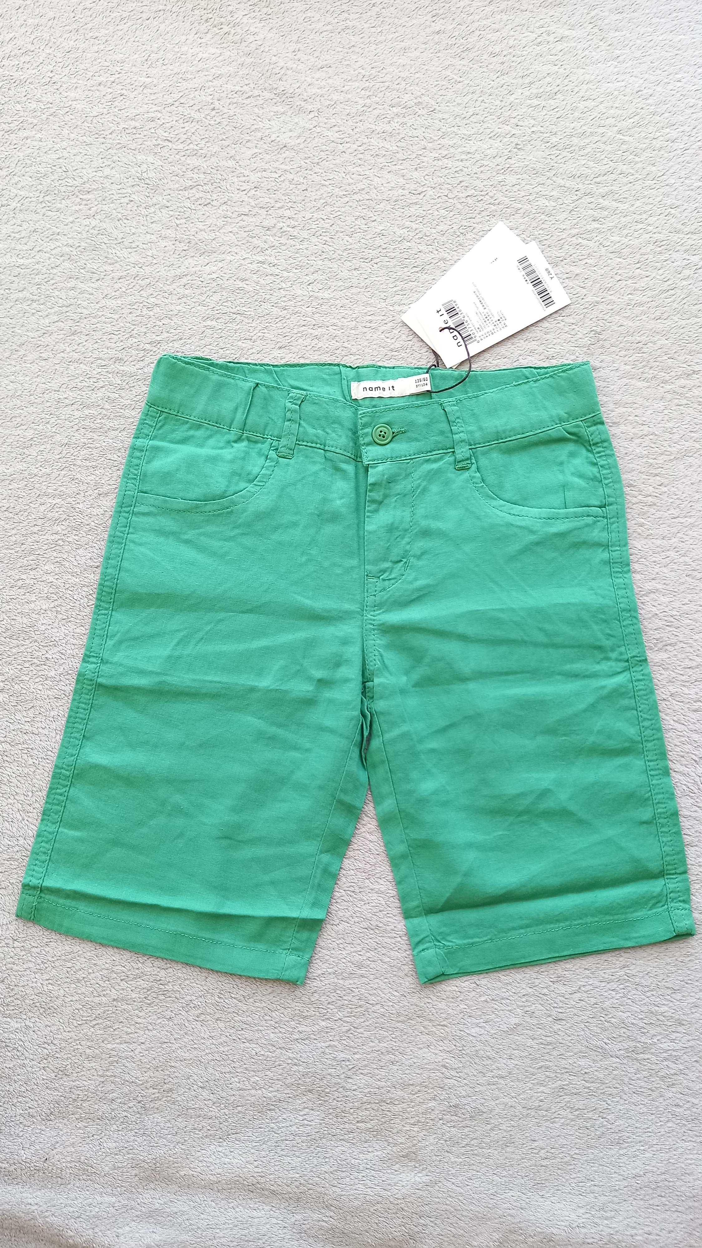 

Шорты летние для мальчика фирмы Name it S66 зеленые размер 134