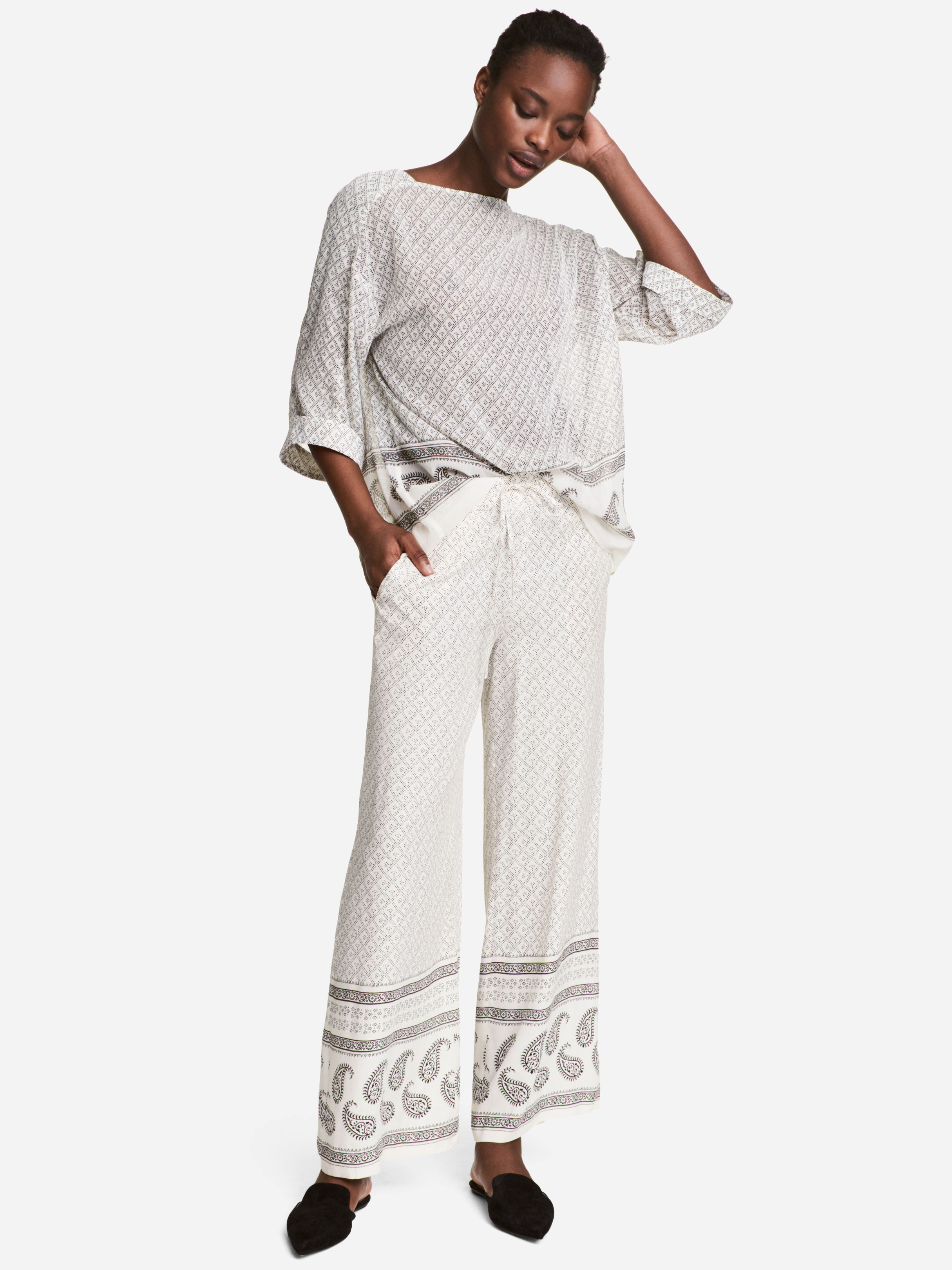 

Брюки H&M 5106756-ADNT 42 Белые с коричневым