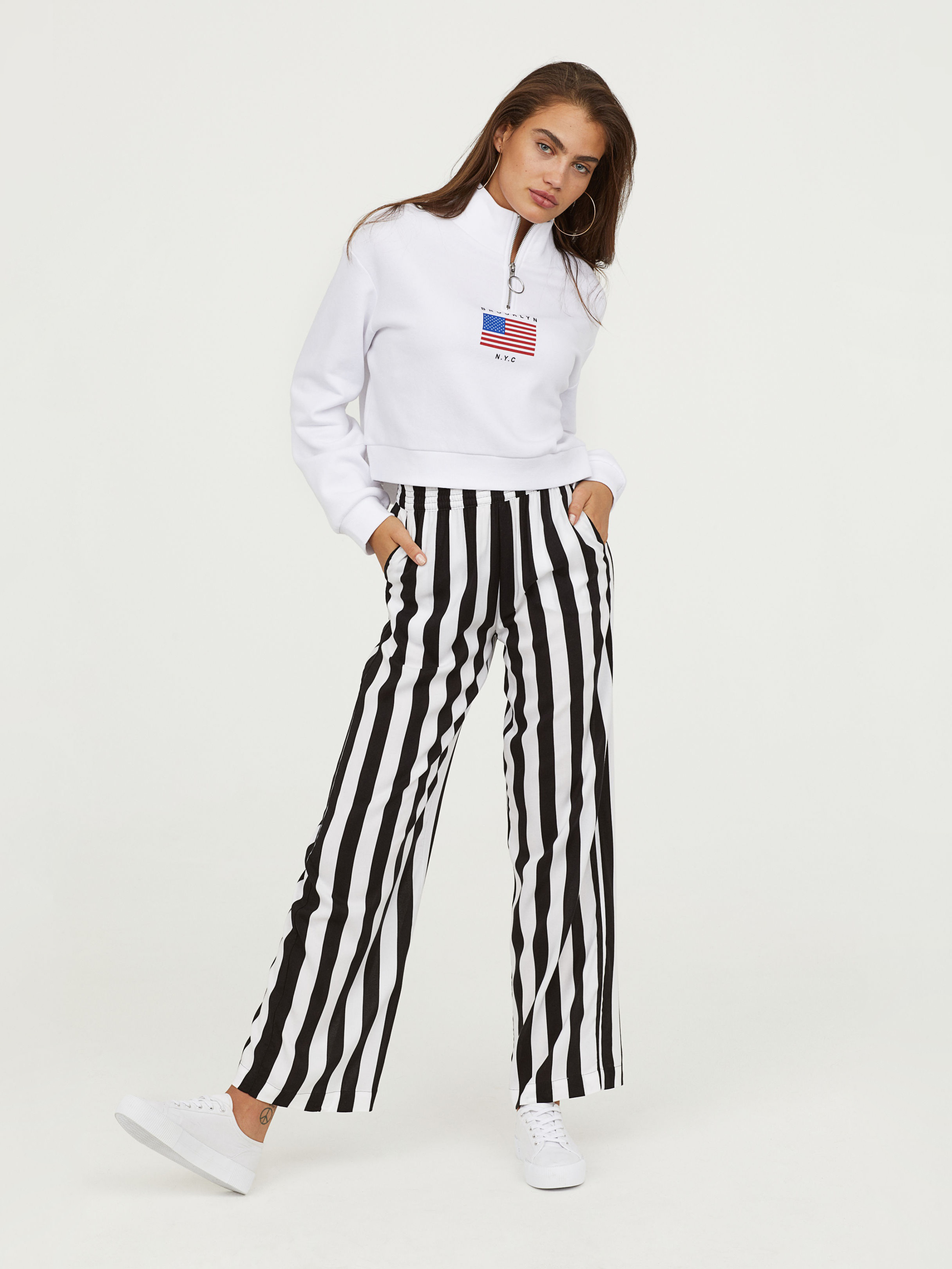 

Брюки H&M 5942647-AAMY 32 Черные с белым