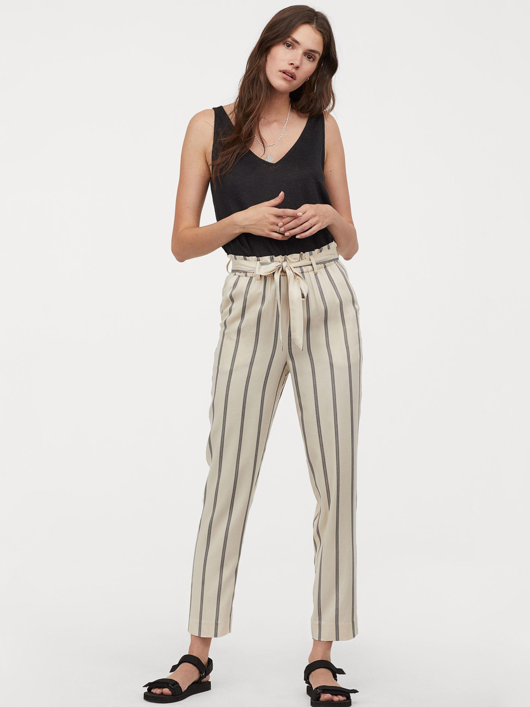 

Брюки H&M 6643199-AAXK 32 Бежевые с черным
