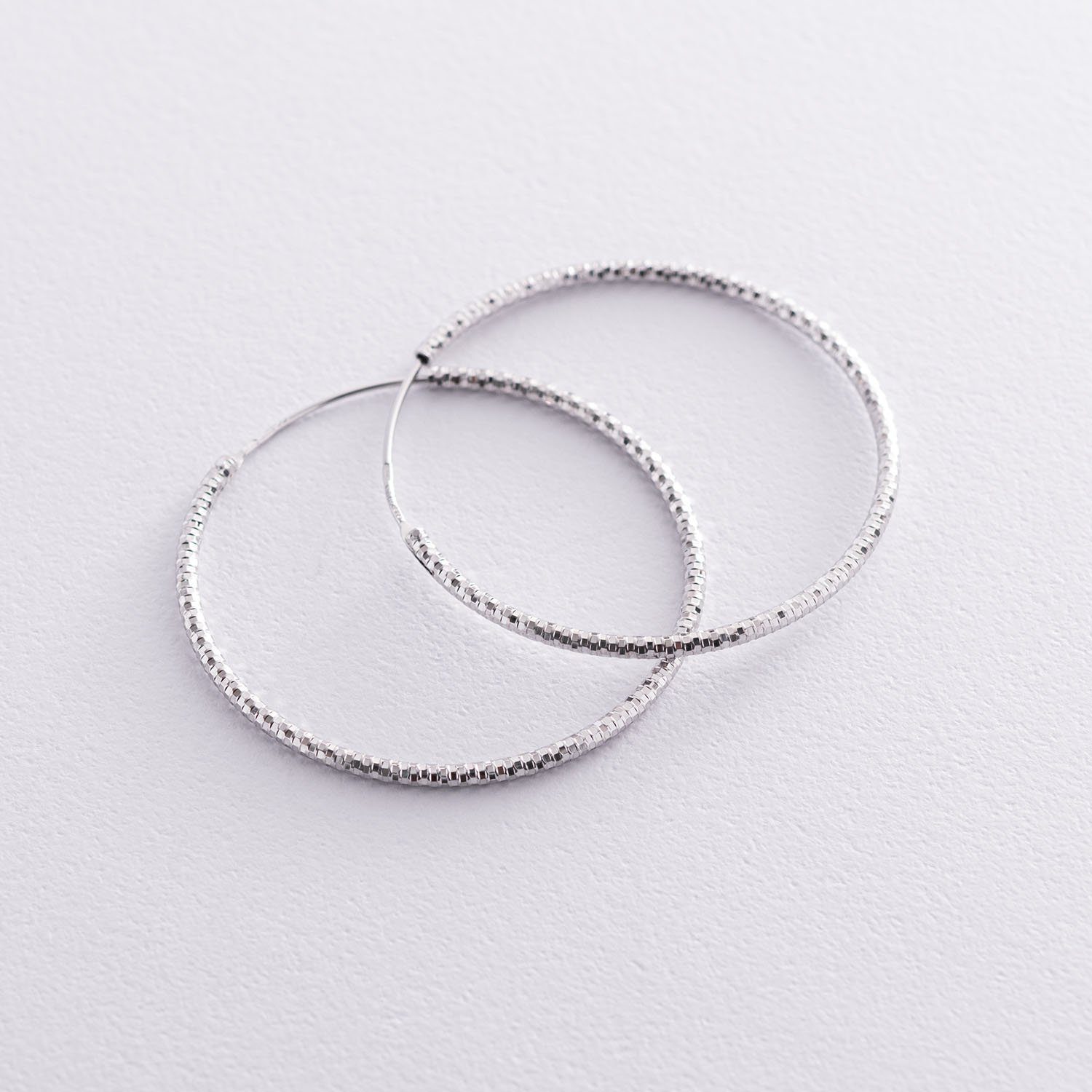 

Серьги - кольца в серебре (4.1 см) 122962 Оникс