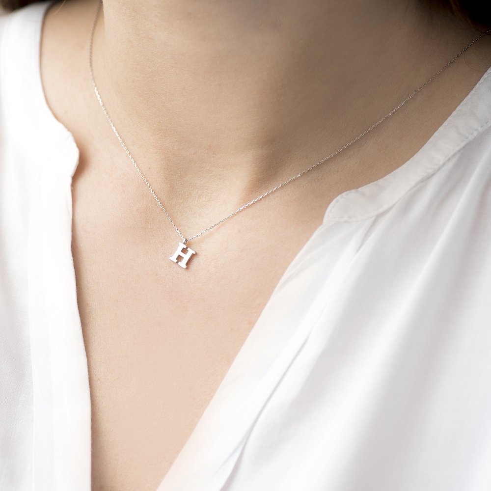 

Серебряное колье с буквой Н 18620 Оникс 45