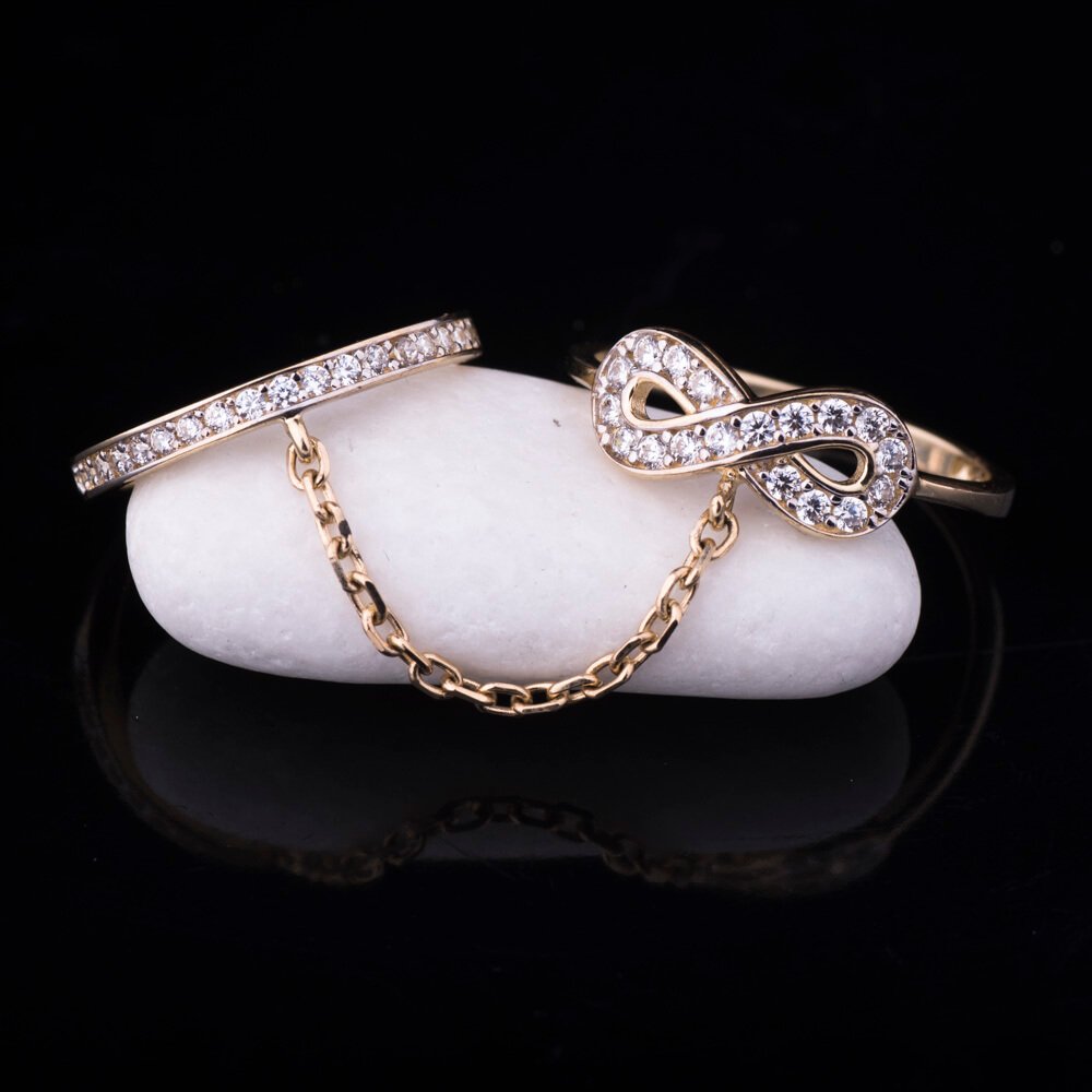 

Двойное кольцо из золота с фианитами к04009 Оникс 18