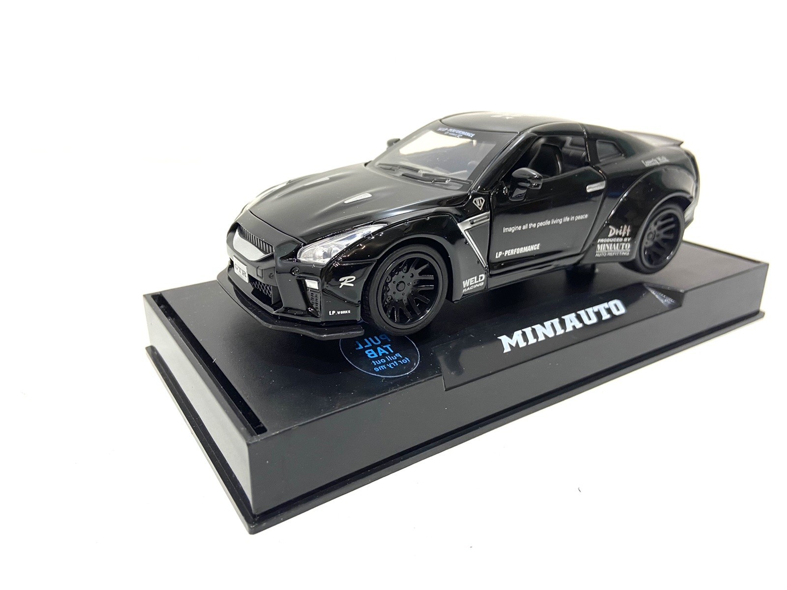 

Машинка TK Union Nissan GTR "Auto Expert"металлическая, свет, звук, инерционная 38071 чёрная