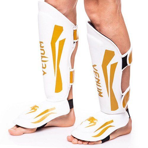

Защита для голени и стопы Venum Elite VL-8314 Без бренду L Бело-золотой (37429194)
