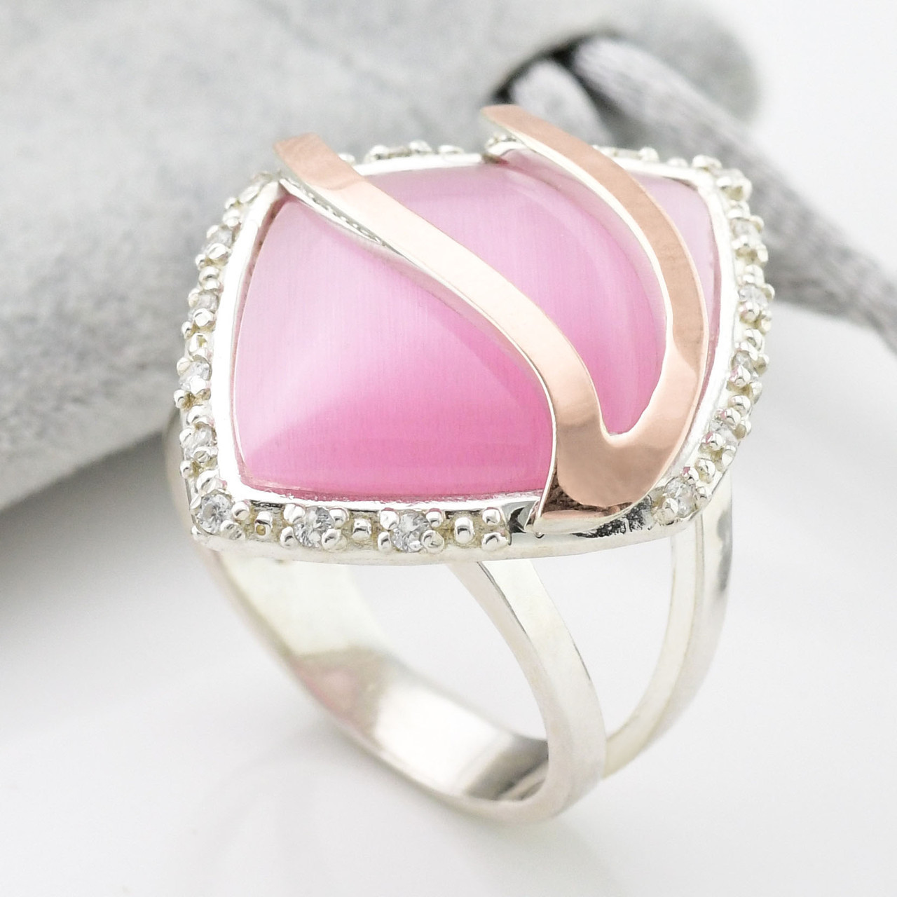 

Серебряное кольцо с золотом Чудо вставка розовый улексит 18