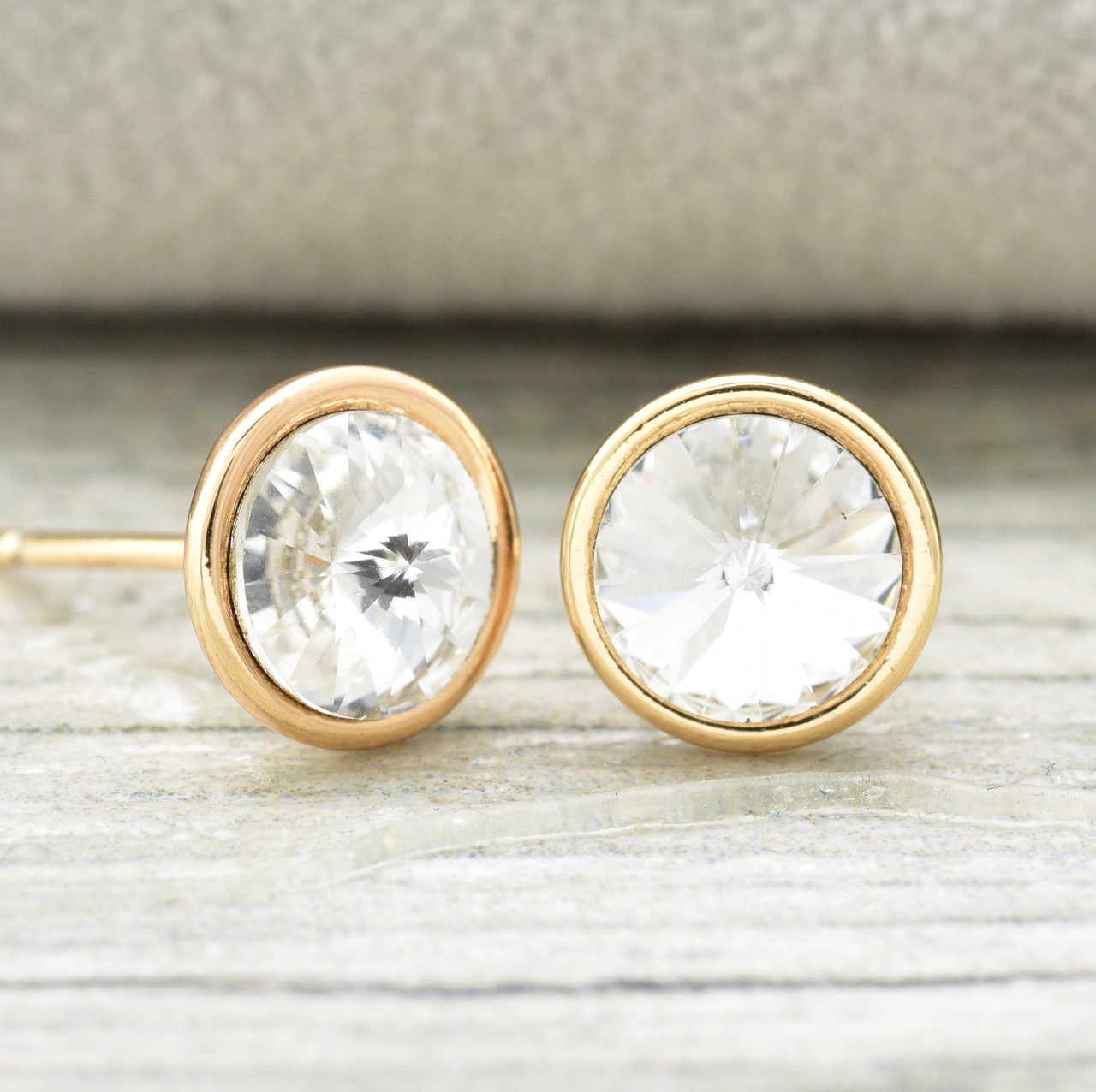 

Сережки Xuping з кристалами Swarovski 83083 розмір 7х7 мм колір білий позолота 18К