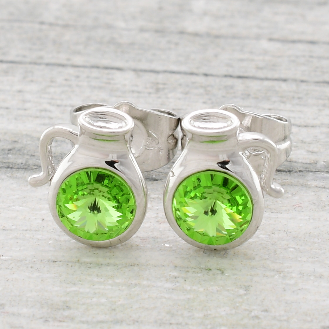 

Сережки Xuping з кристалами Swarovski 83145 розмір 7х7 мм колір салатовий позолота Біле Золото