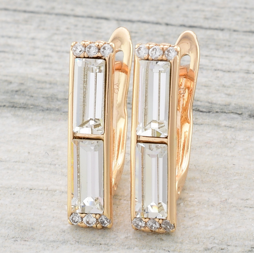 

Сережки Xuping з кристалами Swarovski 83133 розмір 18х5 мм колір білий вага 2.6 г позолота 18К