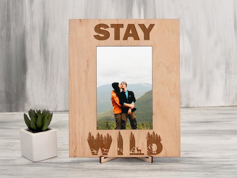 

Подарочная рамка для фото из натурального дерева с гравировкой "Stay wild" 13х18, вертикальная, Светлое дерево, WOODPRESENT