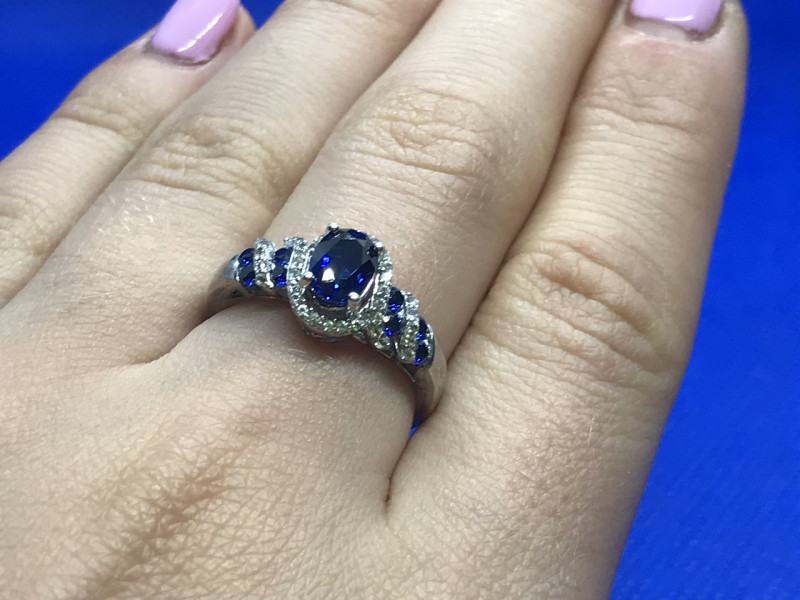 

Серебряное кольцо с синим топазом и бесцветной шпинелью Sky Jewelry 000170