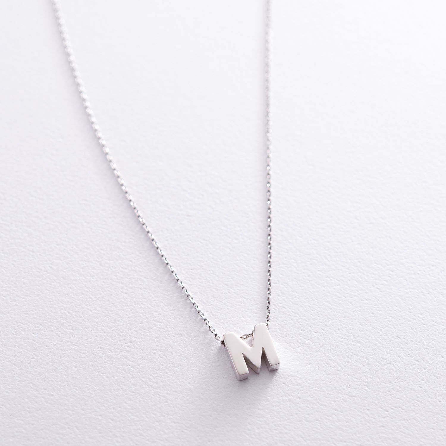 

Серебряное колье с буквой "М" 18985М Оникс 40
