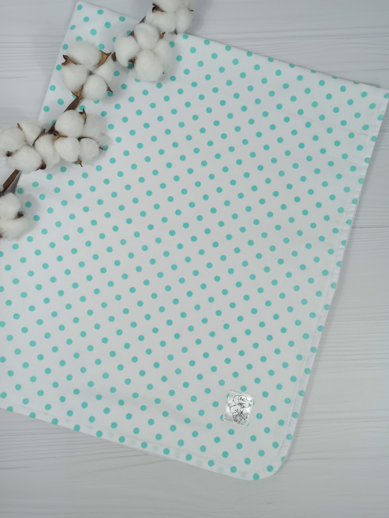 

Детская непромокаемая пеленка a.l.babybox Горох мятный 80*100 см Белый