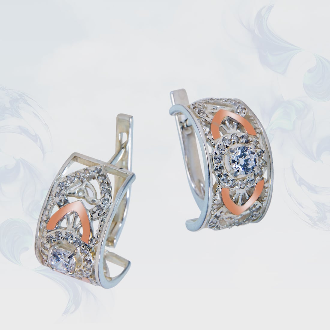 

Серьги из серебра с золотыми вставками SilverUA модель 138