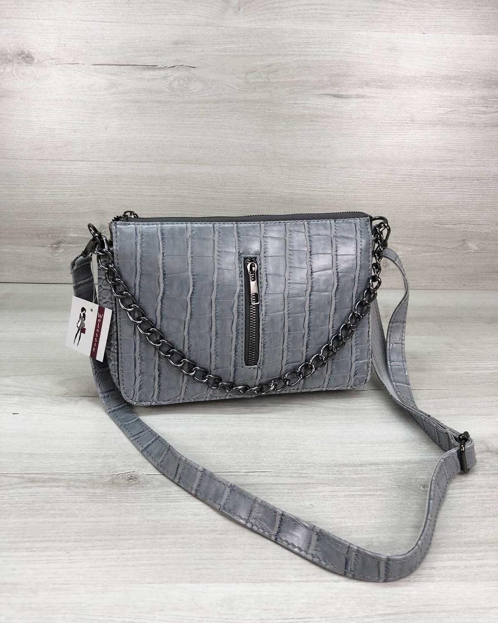 

Сумка-клатч женская кожаная WeLassie Tina Серо-Голубого цвета 25 х 8 х 17 см