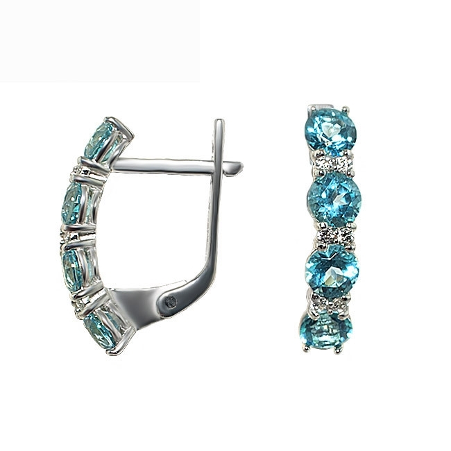 

Серебряные серьги с голубыми топазами Swarovski Веночек UMAX 20245TP