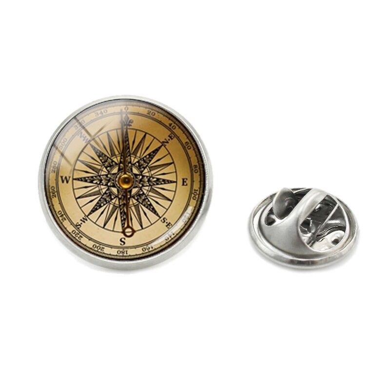 

Брошь-значок унисекс BROCHE бижутерия Компас коричневая BRGV112275