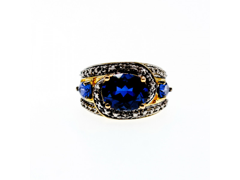 

Серебряное кольцо в позолоте с сапфирами Натуральный Sky Jewelry 003569