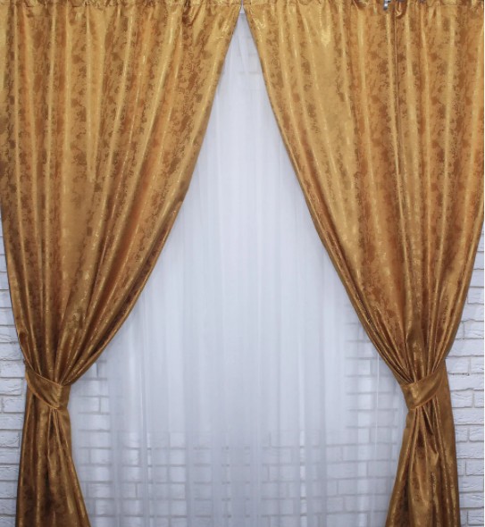 

Комплект готовых однотонных штор из жаккарда. Цвет золотой