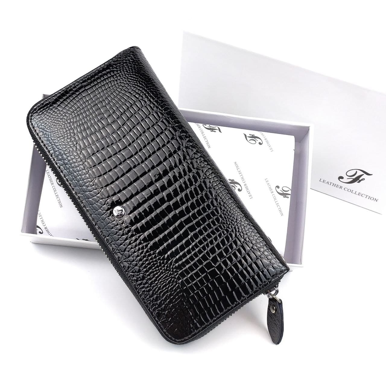 

Кожаный женский лаковый кошелек-клатч на одну молнию Salfeite F-AE38-1-BLACK черный