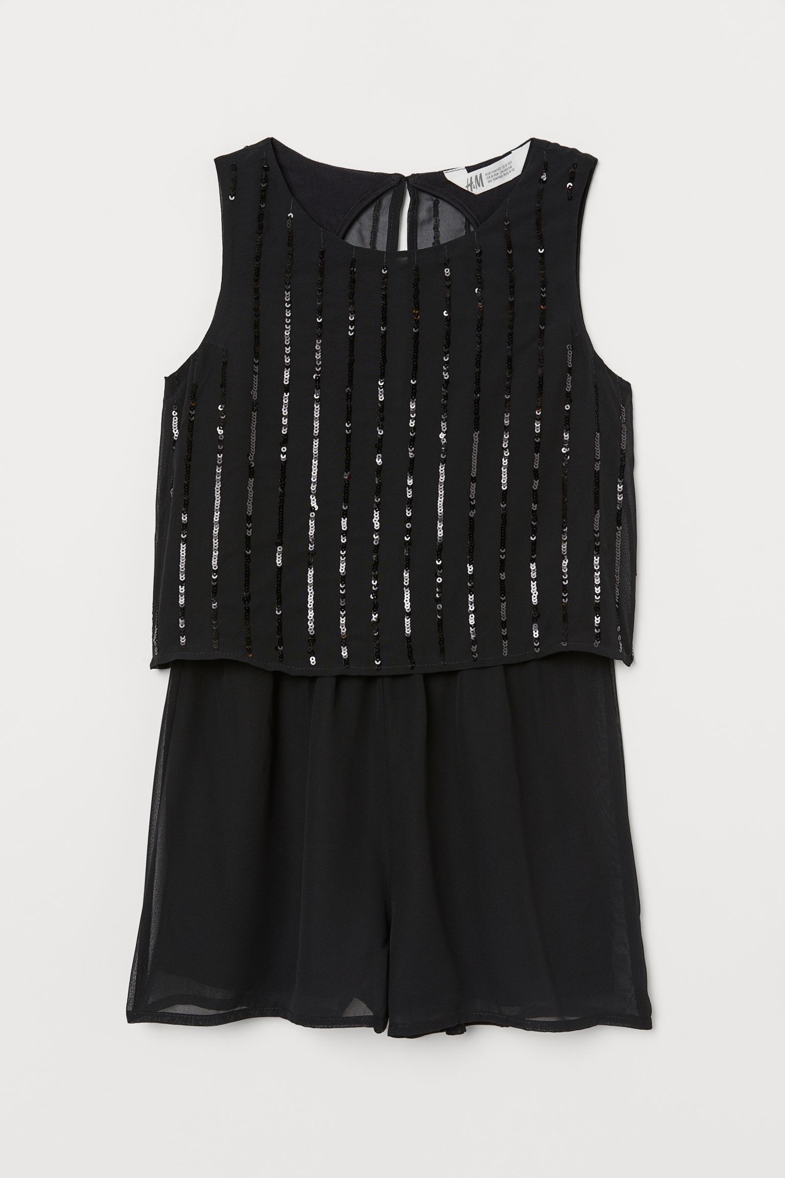 

Комбинезон H&M 134см черный 2110762097