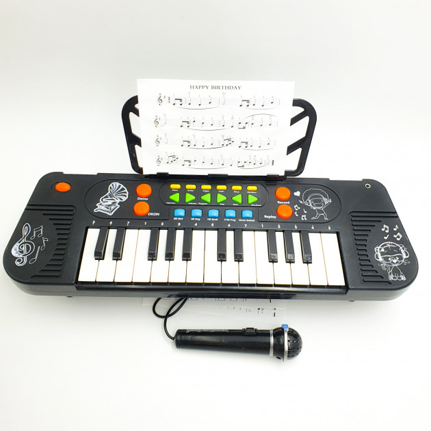 

Пианино детское синтезатор на батарейках с микрофоном и функцией записи, программирования ритма 25 клавиш 8814A