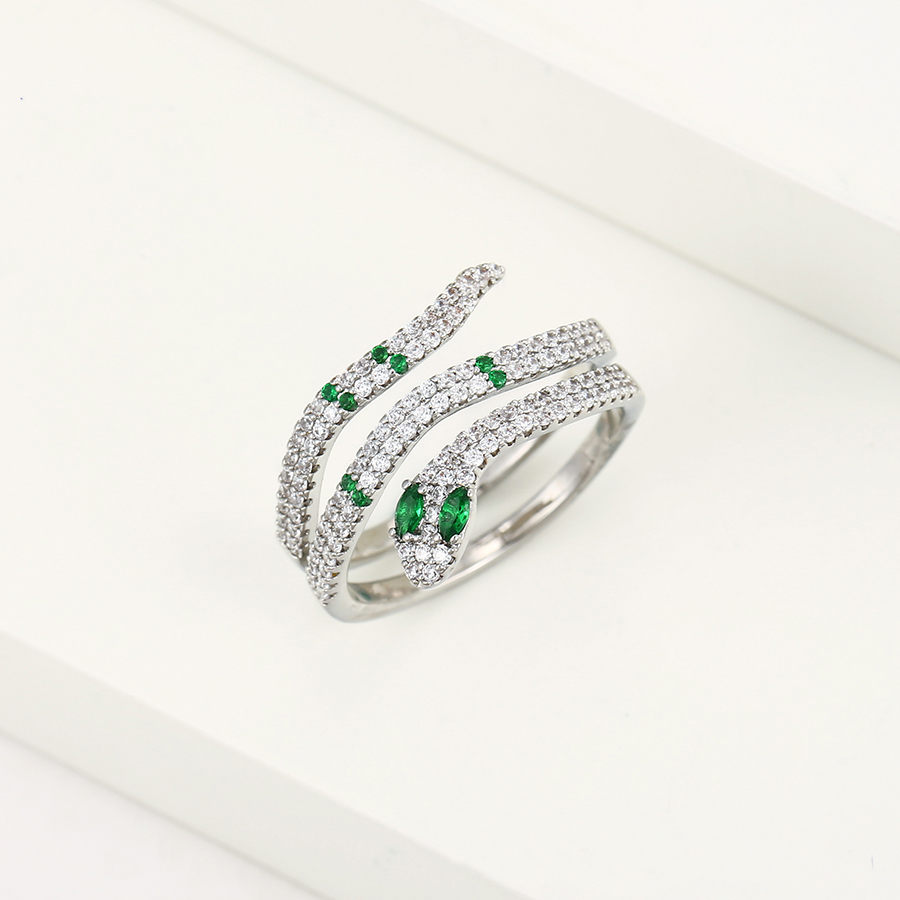 

Кольцо 36030 ширина 12 мм белые и зеленые фианиты позолота Белое Золото16-17