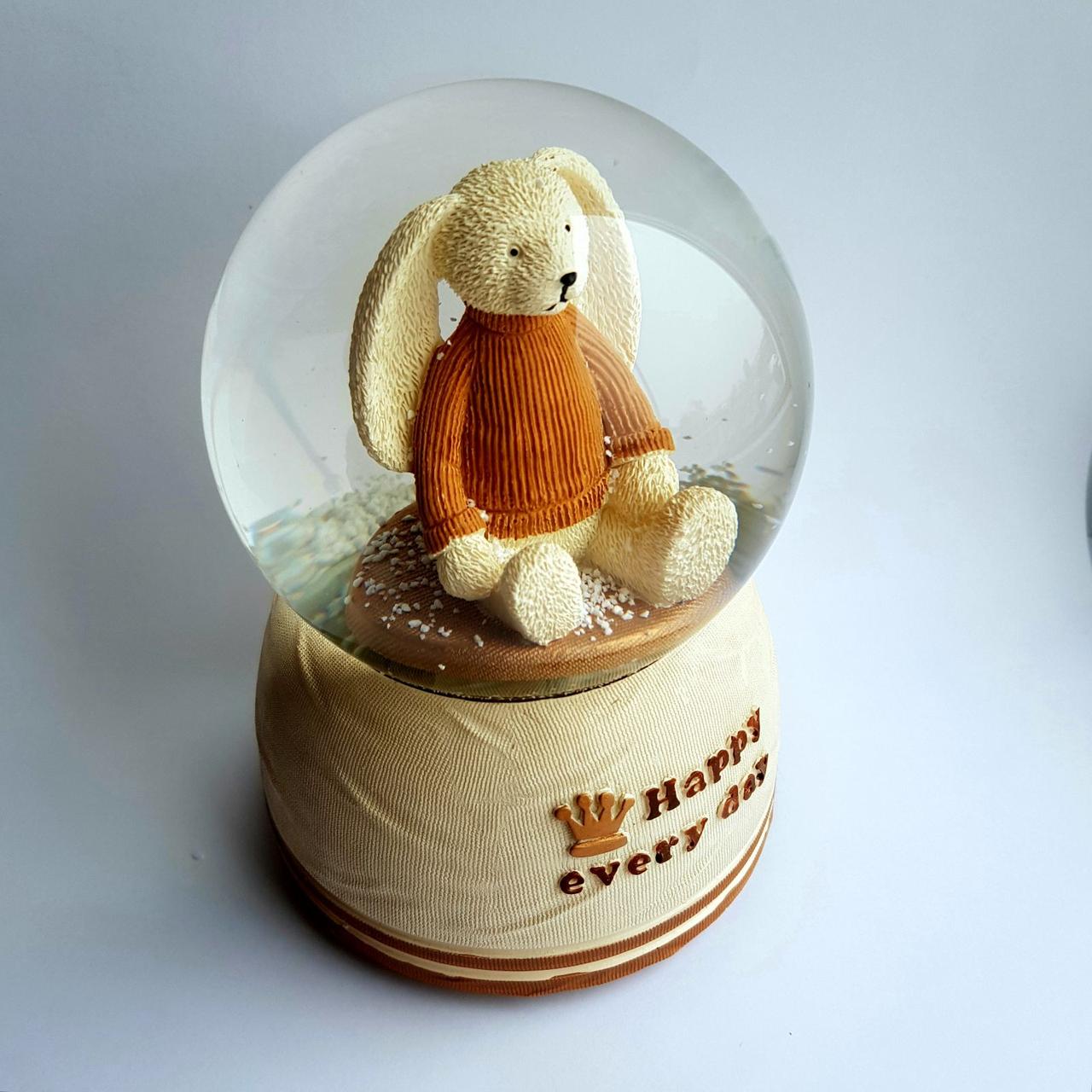 

Снежный музыкальный шар c автоснегом и подсветкой Happy bunny 10х16 см