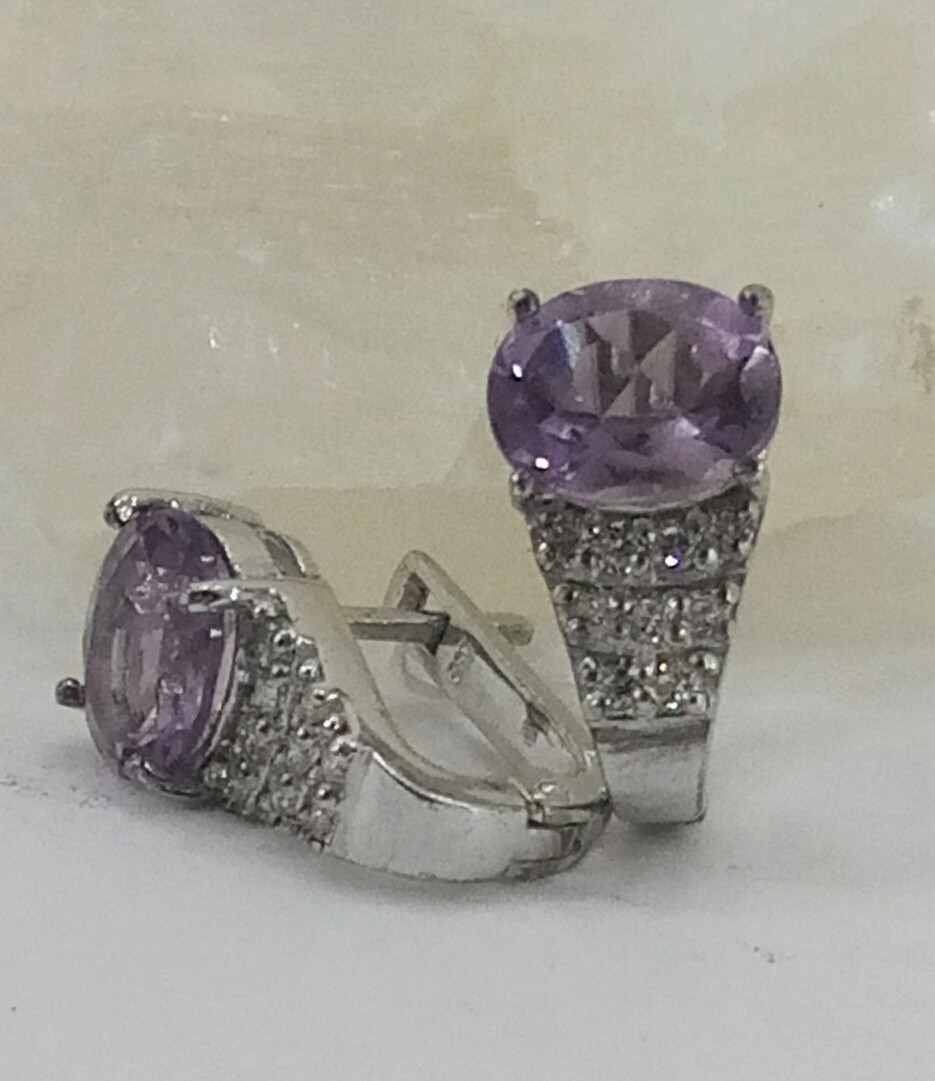 

Серьги из серебра с аметистами и куб. цирконами (101398/118)