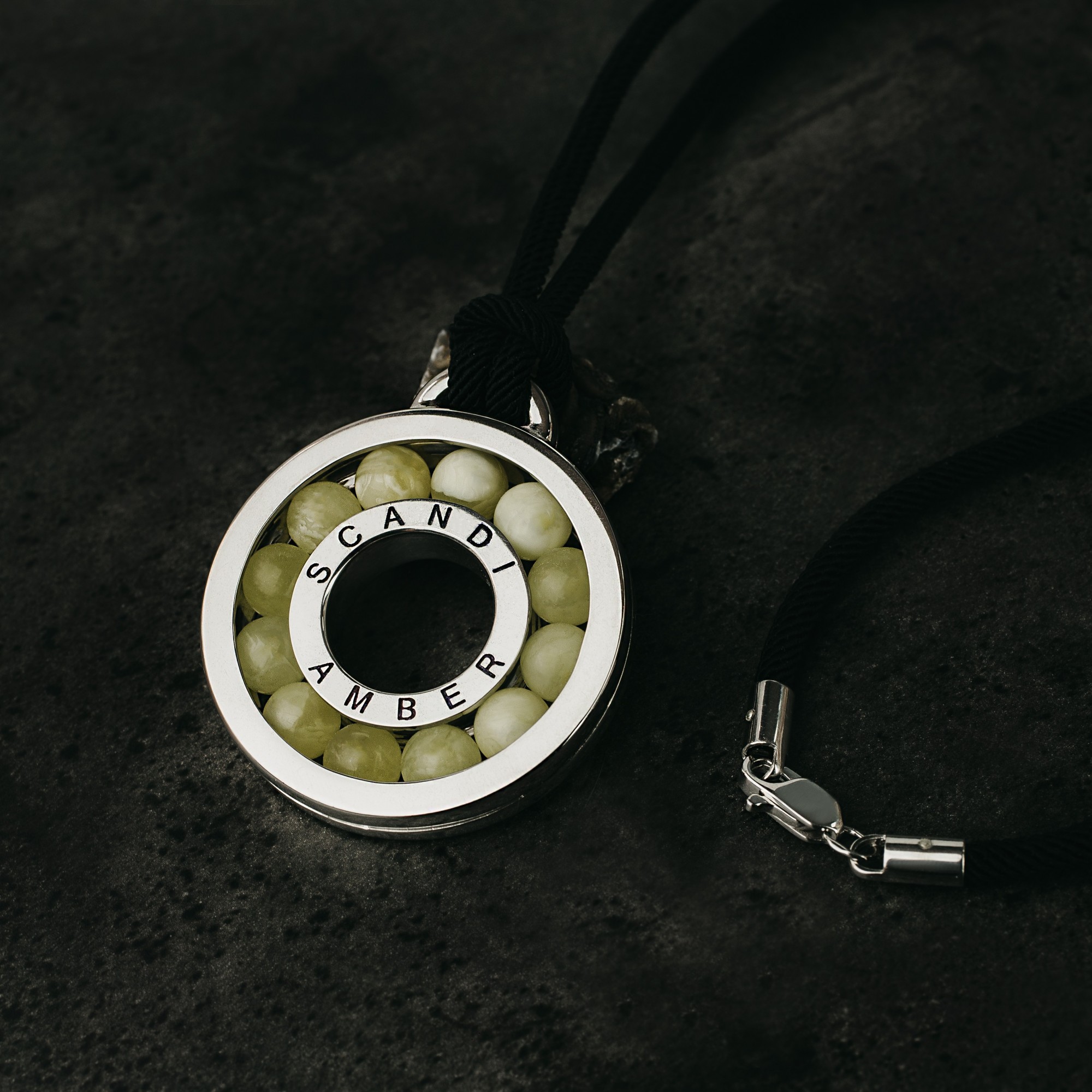 

Серебряная подвеска с натуральным ЯНТАРЁМ "Подшипник" ILSAV ( Родированная подвеска с натуральным ЯНТАРЁМ )