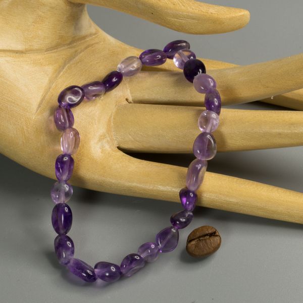 

Браслет Камни-Маркет с Натуральным Аметистом бусины 6х9 мм на резинке