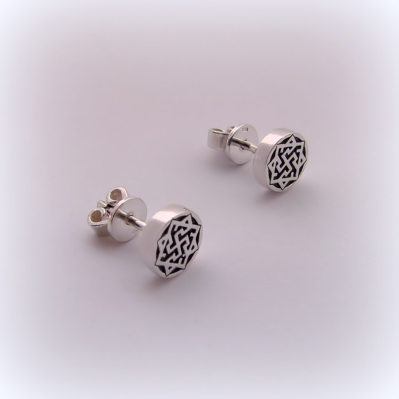 

Серебряные серьги-гвоздики Валькирия 925 проба