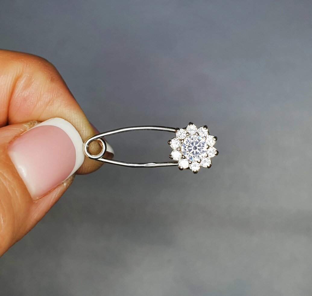 

Серебряная брошка-булавка с кубическим цирконием "Солнце" 1,6 г