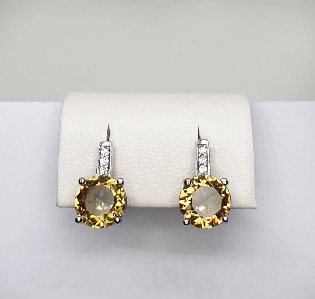 

Сережки серебряные с султанитом и кубическим цирконием 3,88