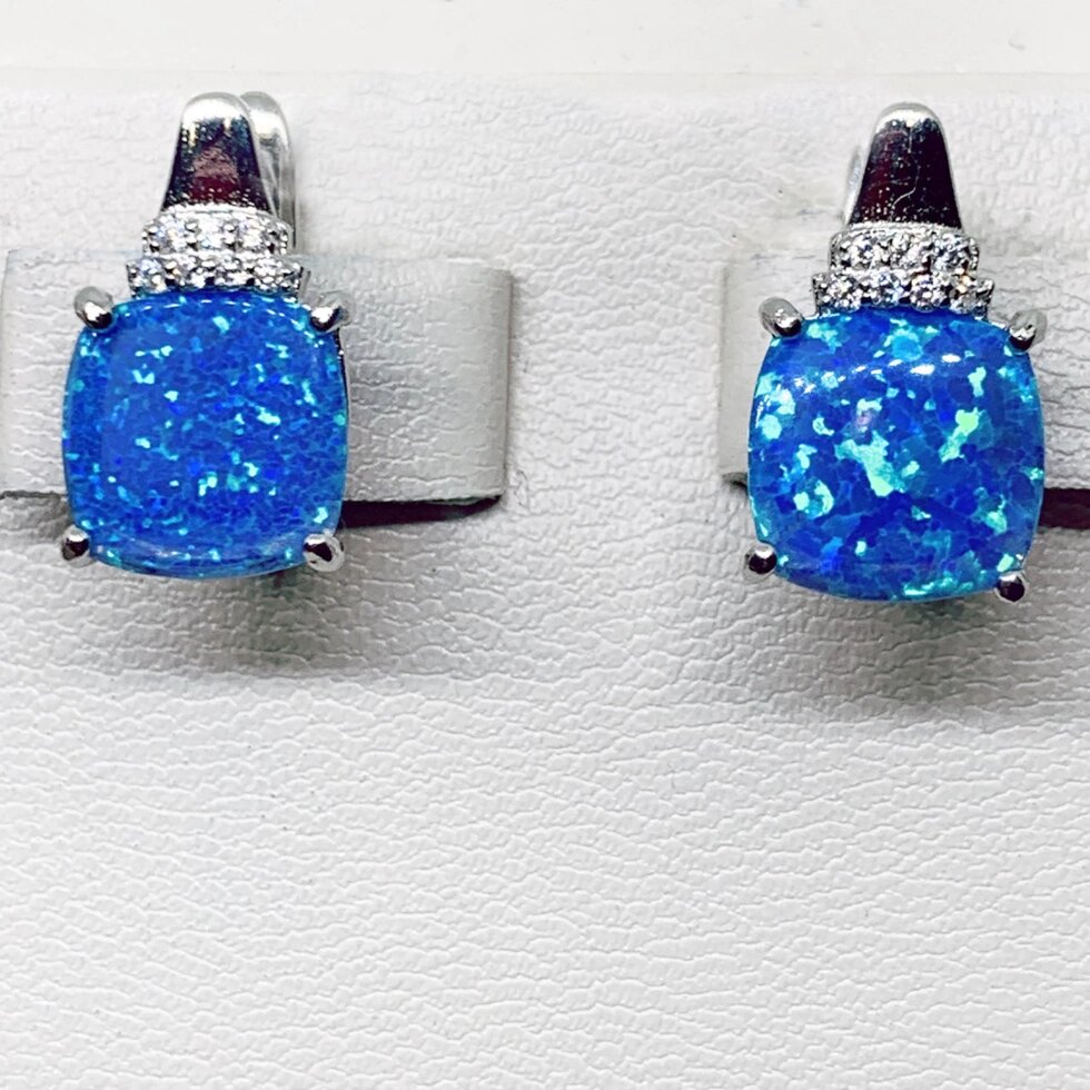 

Сережки серебряные с голубым опалом и кубичесим цирконием 2,73 г