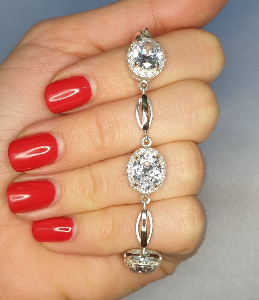 

Браслет серебряный с кубическим цирконием и золотыми пластинами 14,55 г