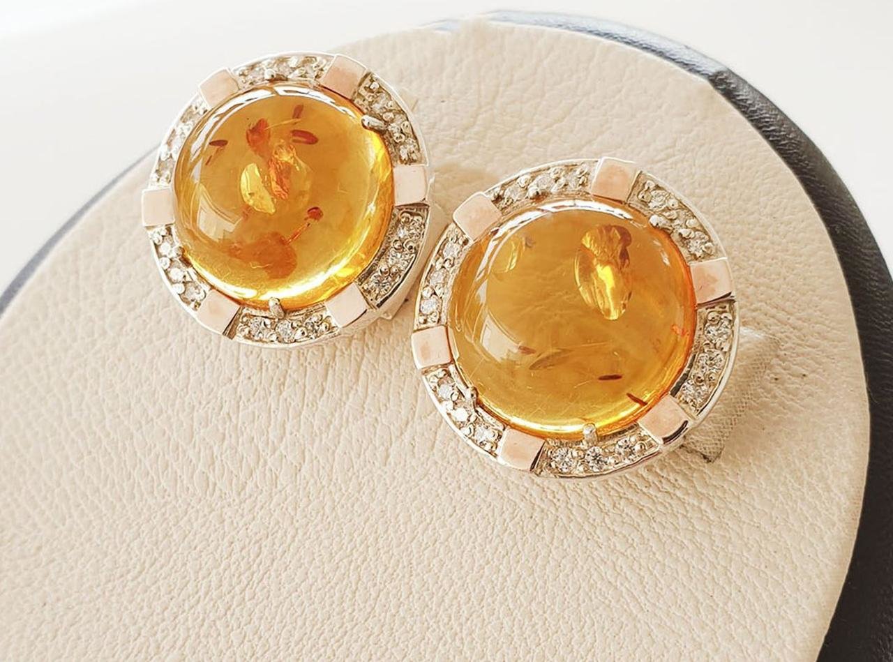 

Сережки серебряные с янтарем 8,15 г