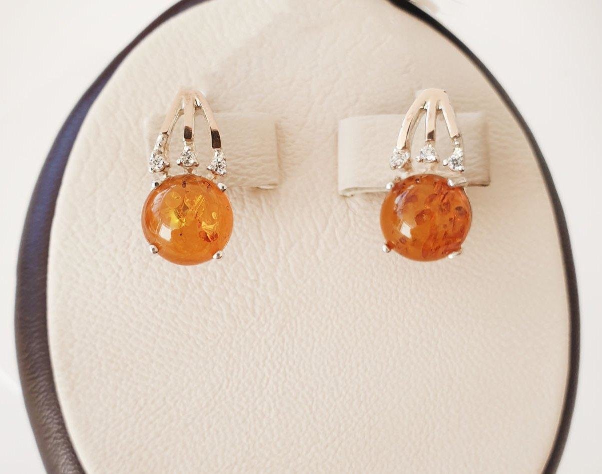 

Сережки серебряные с янтарем 4,58 г