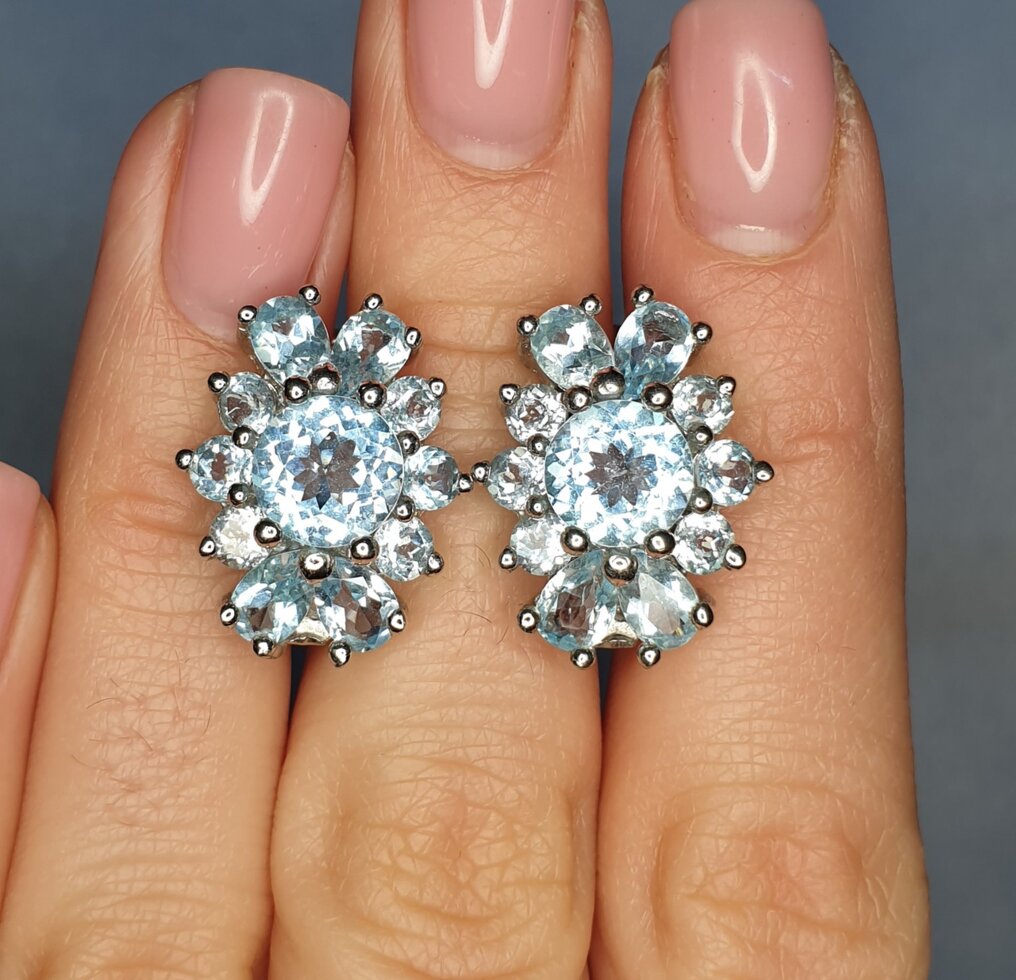 

Сережки серебряные с голубым топазом 11,1 г