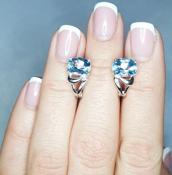 

Сережки серебряные с голубым топазом 4,55 г