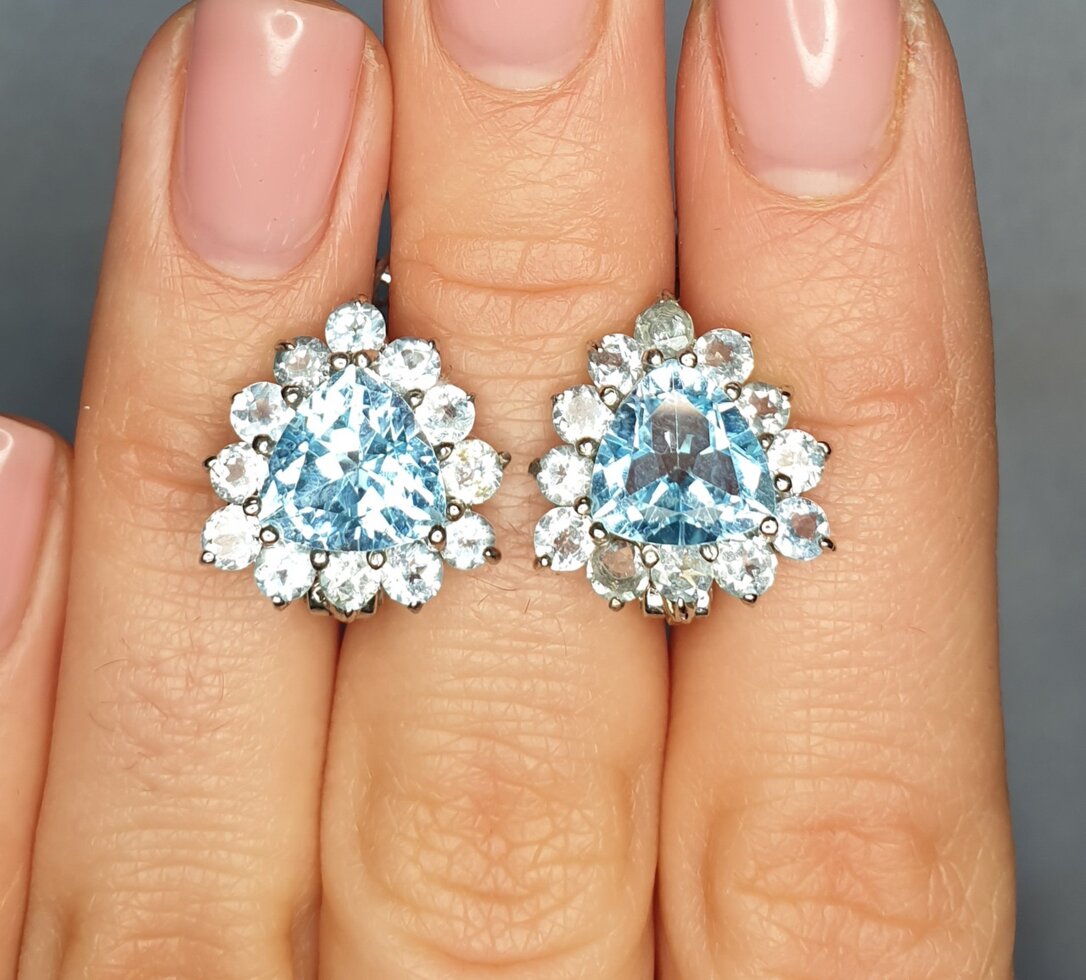 

Сережки серебряные с голубым топазом и кубическим цирконием 8,32 г